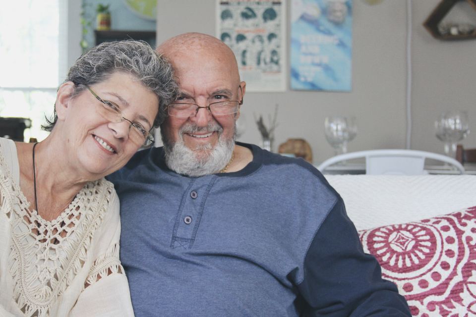 A smiling senior couple at home